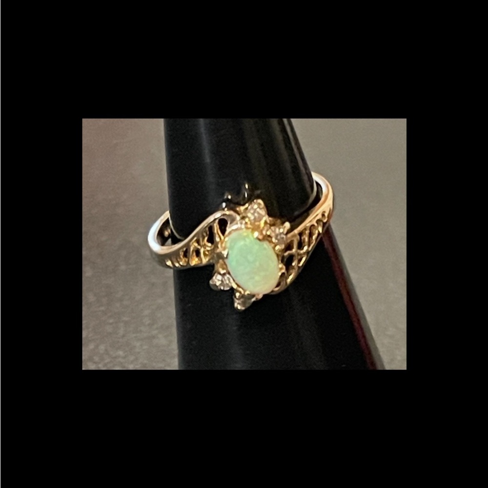 14K Solid Gold Vintage Natural Opal Ring w/Diamond Accents.
Market GTR 14K
3 1/2